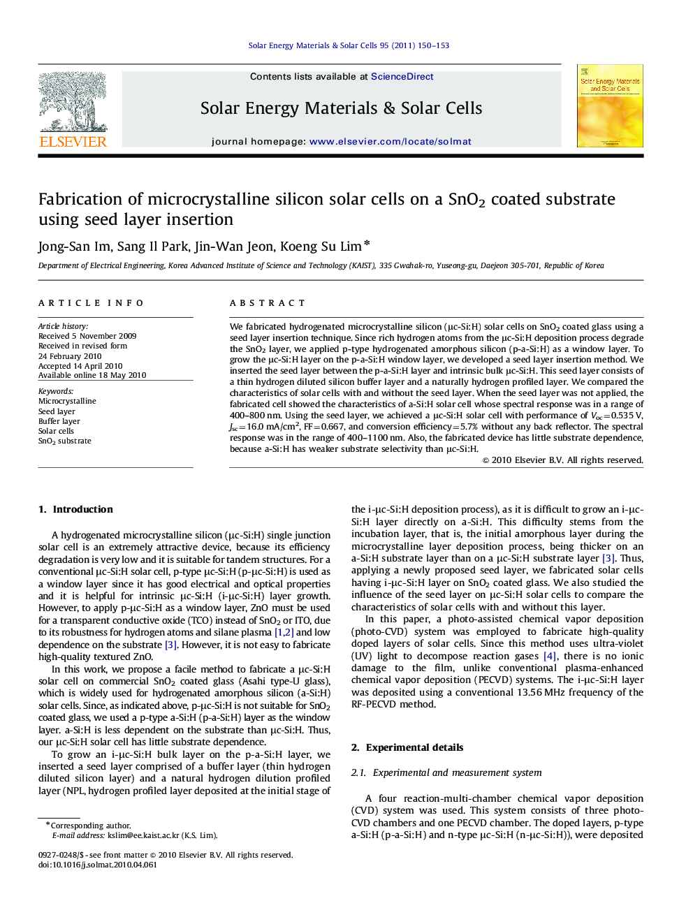 Fabrication of microcrystalline silicon solar cells on a SnO2 coated substrate using seed layer insertion