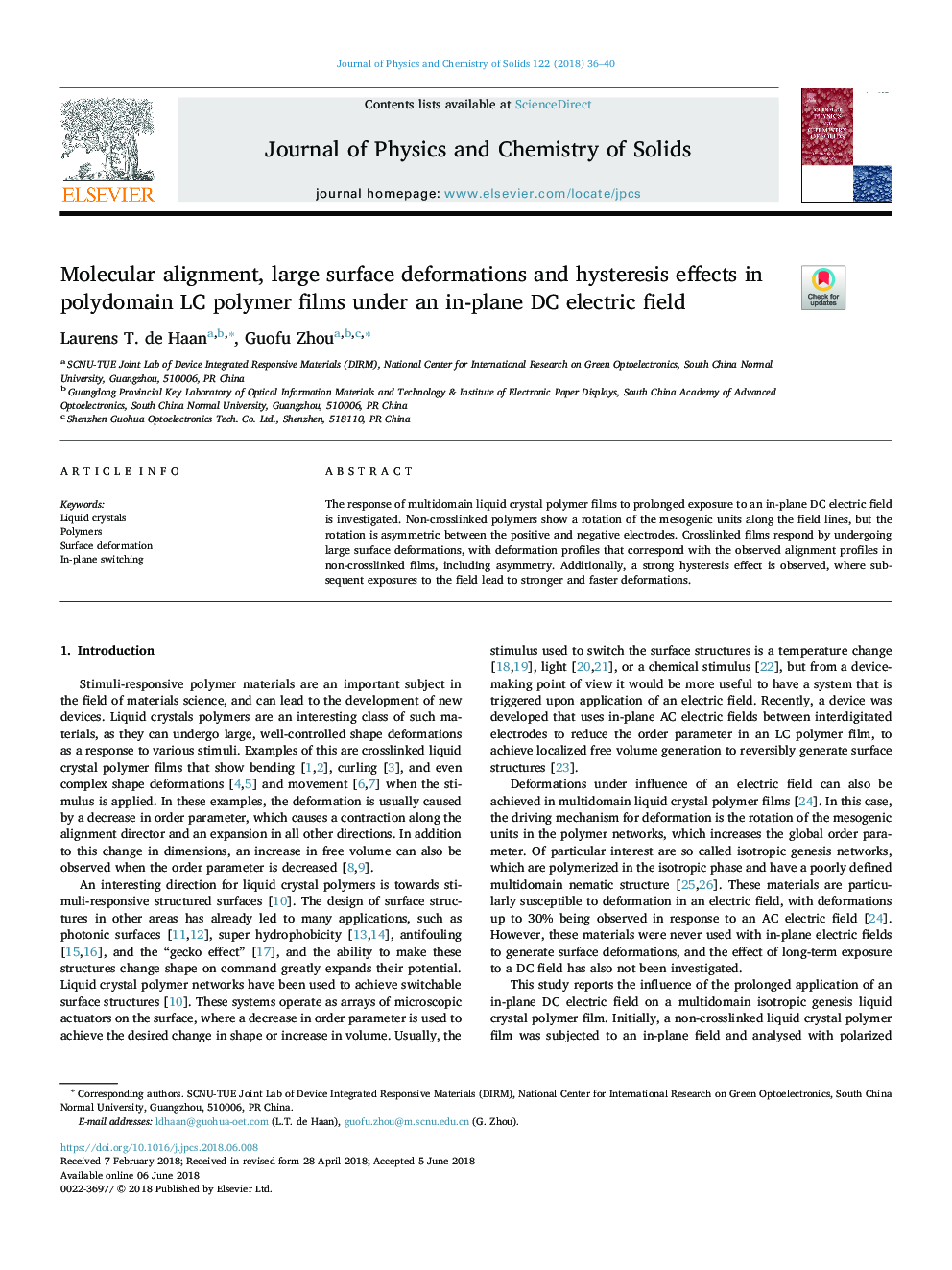 Molecular alignment, large surface deformations and hysteresis effects in polydomain LC polymer films under an in-plane DC electric field