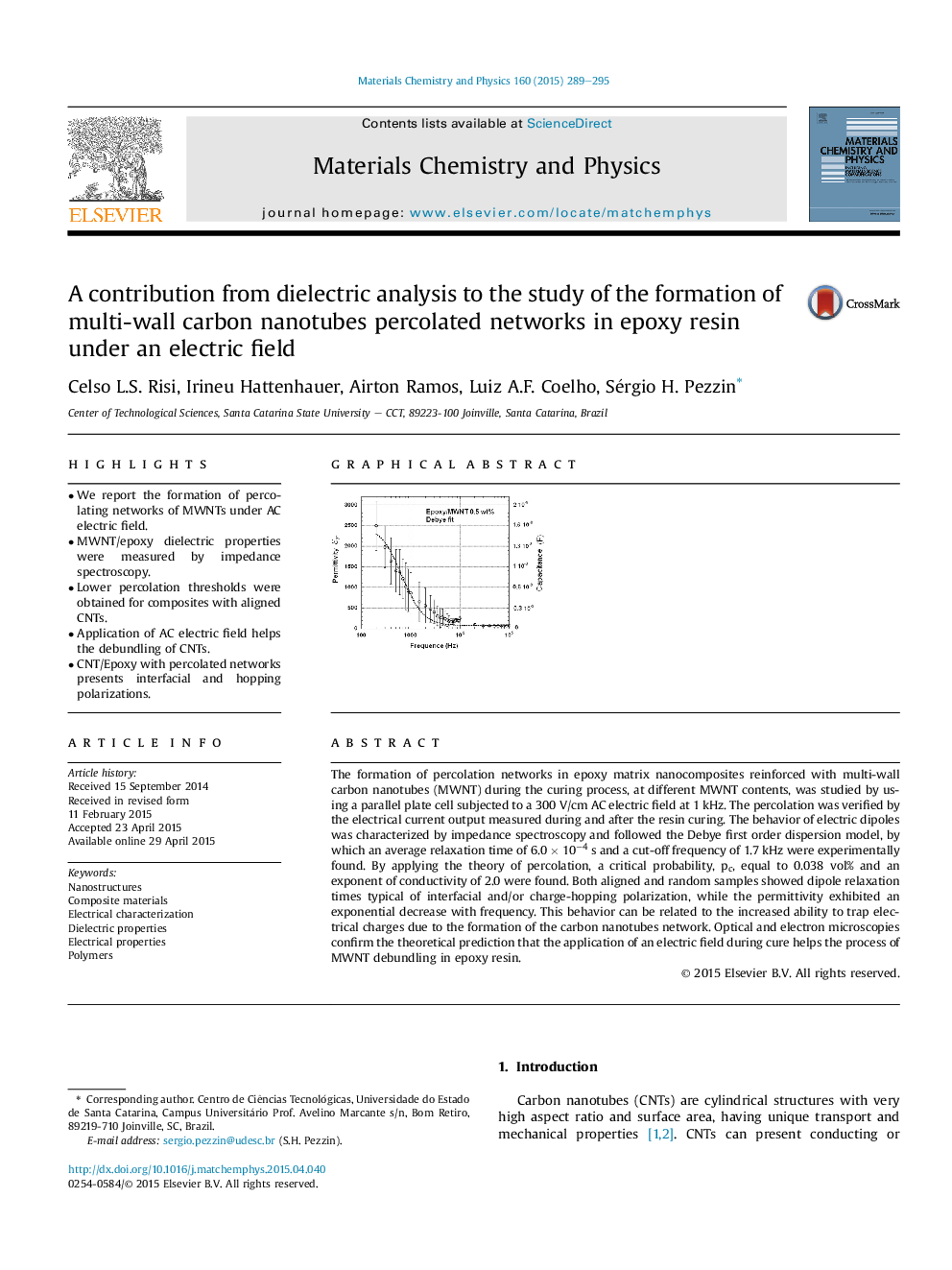 A contribution from dielectric analysis to the study of the formation of multi-wall carbon nanotubes percolated networks in epoxy resin under an electric field