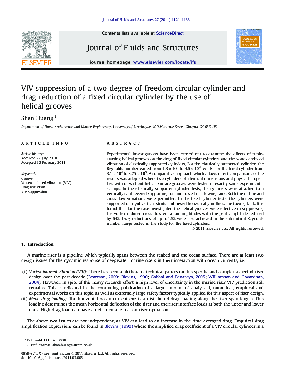 VIV suppression of a two-degree-of-freedom circular cylinder and drag reduction of a fixed circular cylinder by the use of helical grooves