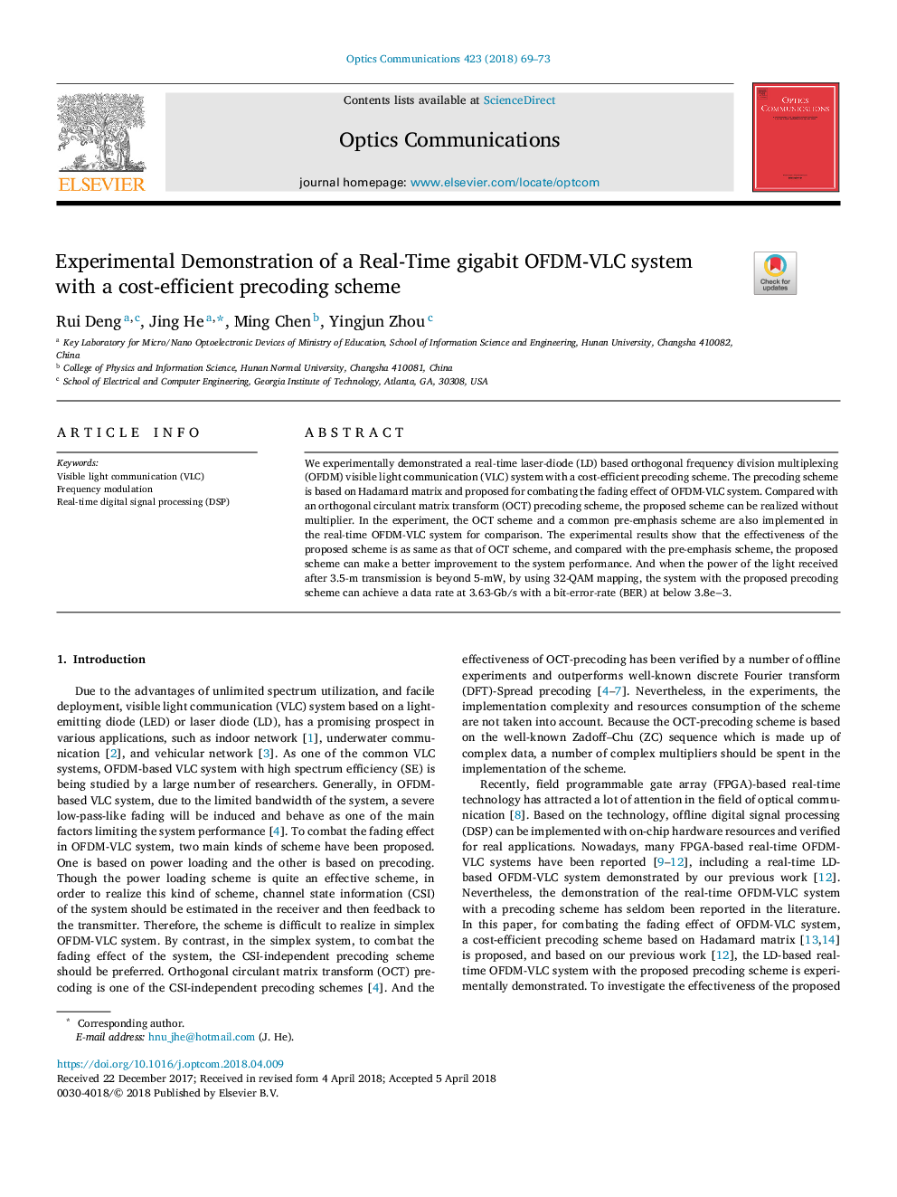 Experimental Demonstration of a Real-Time gigabit OFDM-VLC system with a cost-efficient precoding scheme