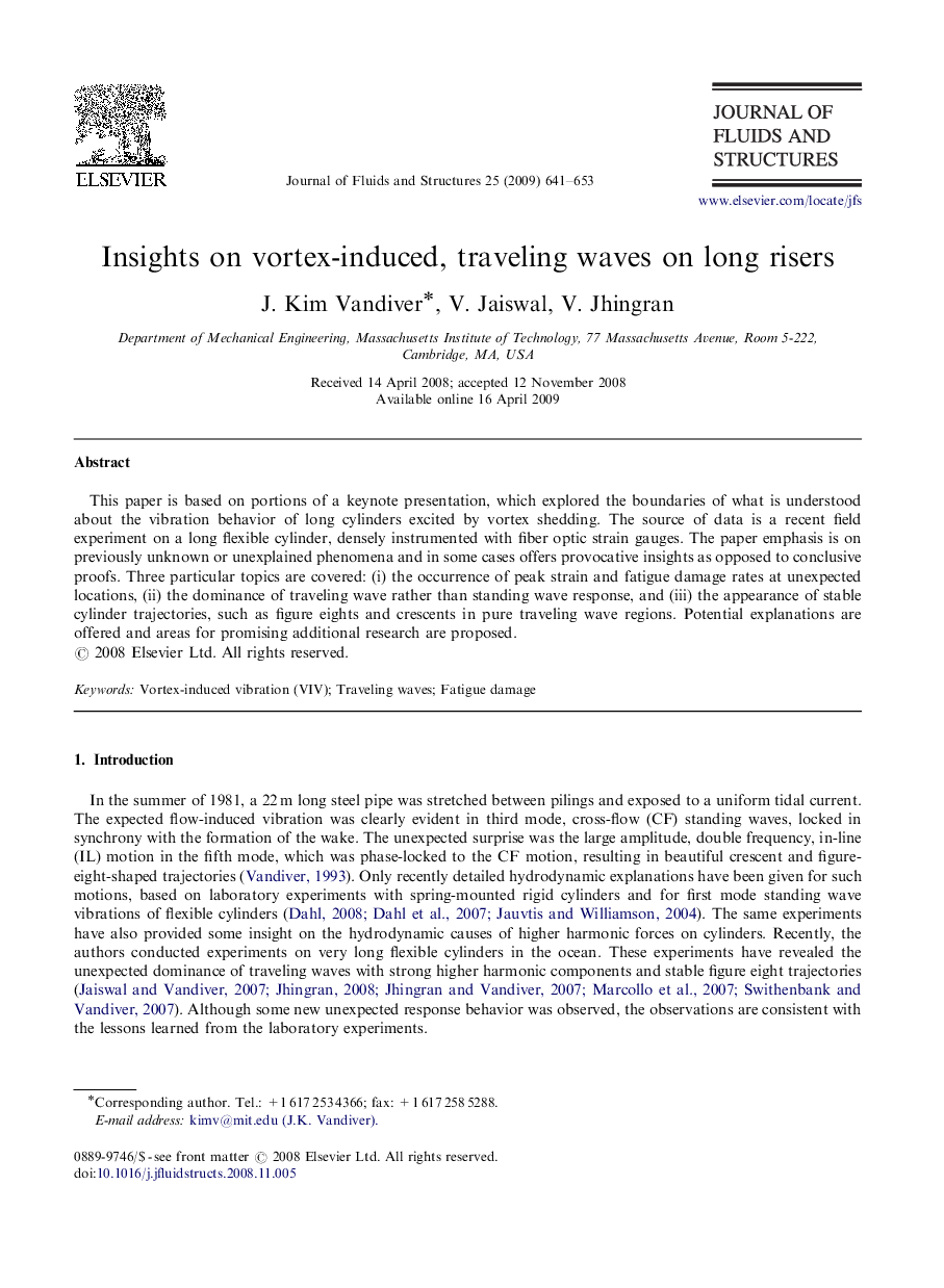 Insights on vortex-induced, traveling waves on long risers