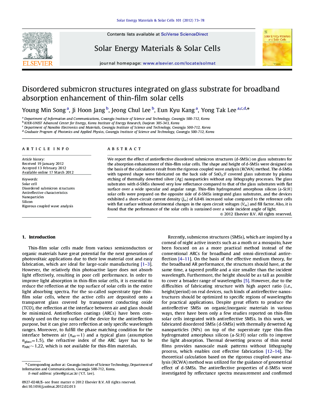 Disordered submicron structures integrated on glass substrate for broadband absorption enhancement of thin-film solar cells