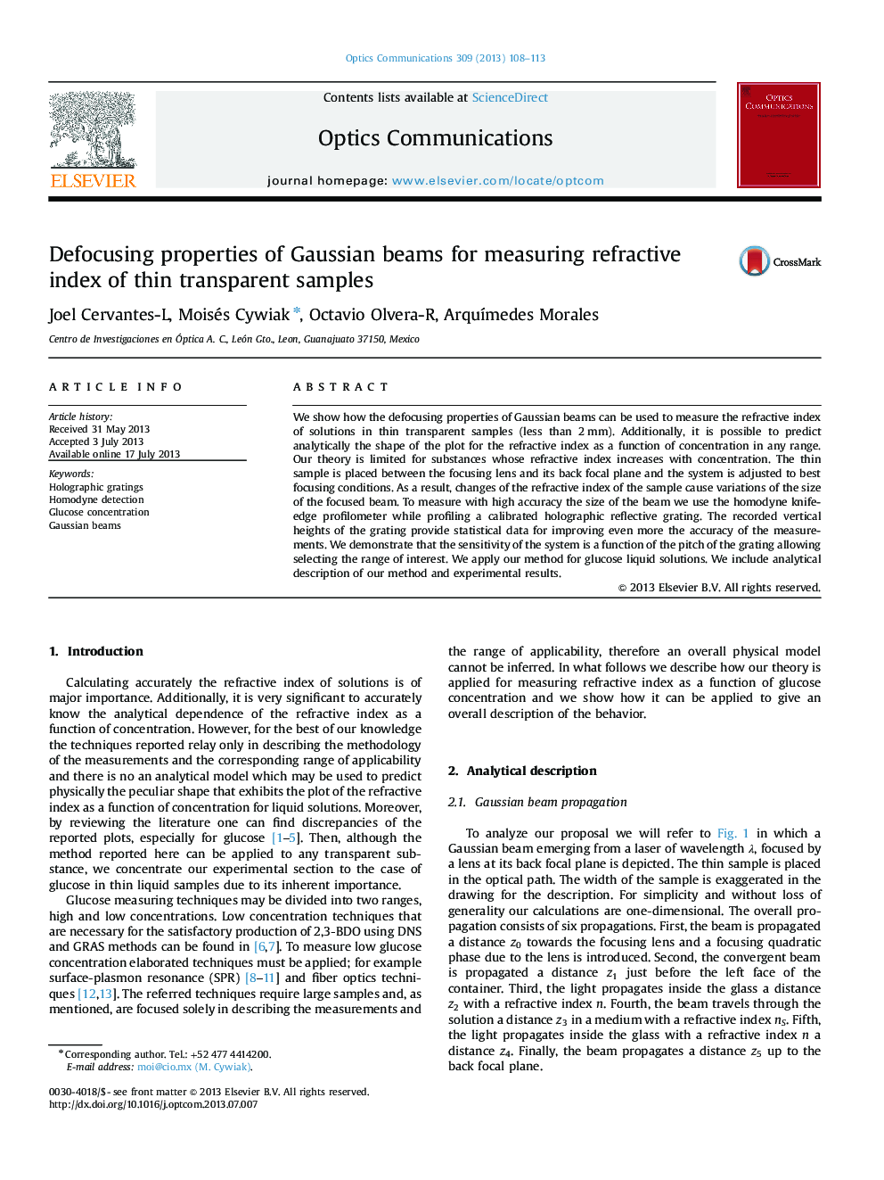 Defocusing properties of Gaussian beams for measuring refractive index of thin transparent samples