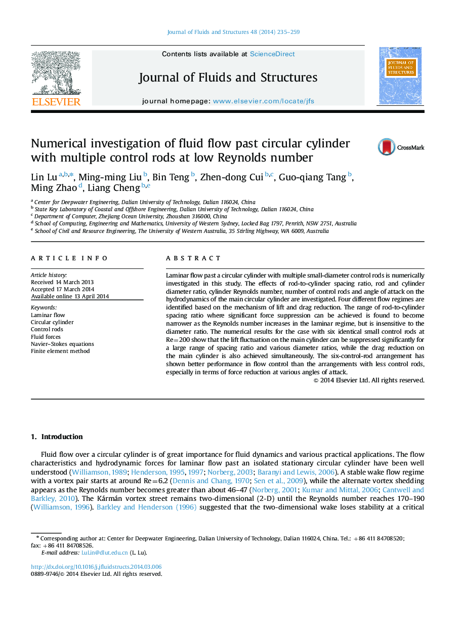 Numerical investigation of fluid flow past circular cylinder with multiple control rods at low Reynolds number