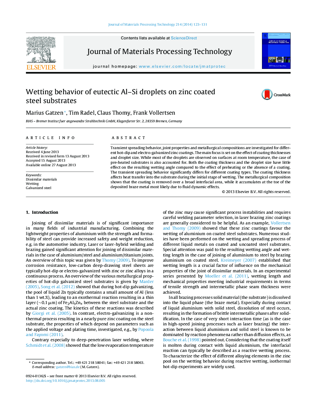 Wetting behavior of eutectic Al–Si droplets on zinc coated steel substrates