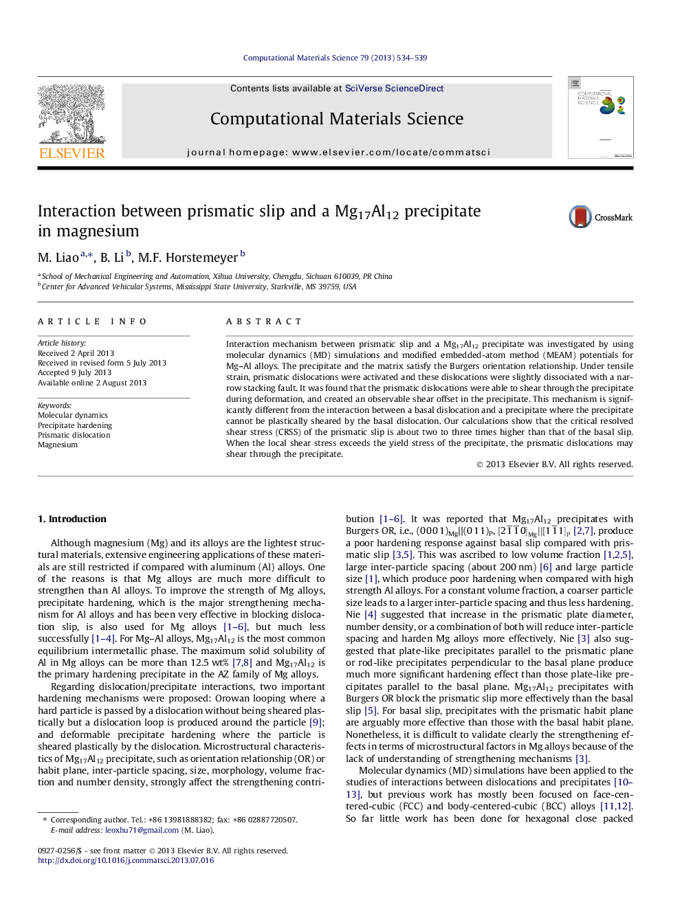 Interaction between prismatic slip and a Mg17Al12 precipitate in magnesium