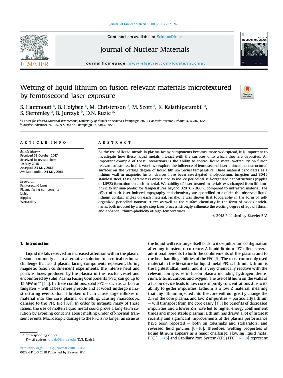 Wetting of liquid lithium on fusion-relevant materials microtextured by femtosecond laser exposure