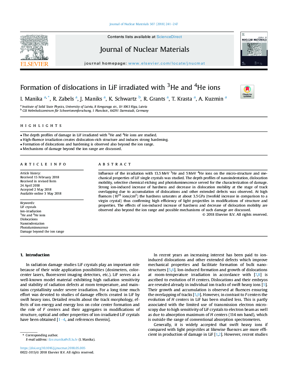 Formation of dislocations in LiF irradiated with 3He and 4He ions