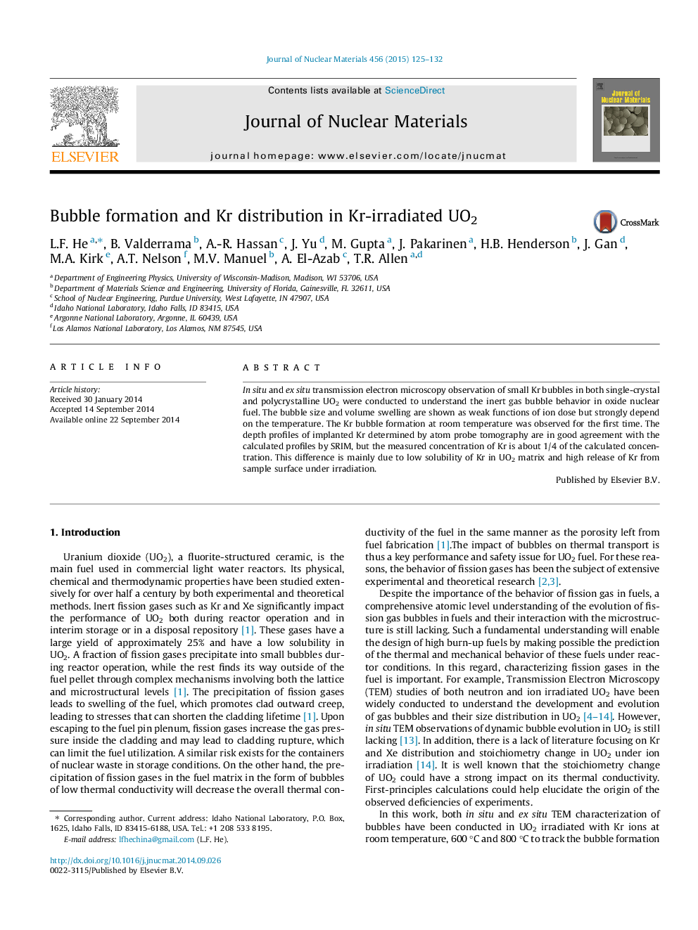 Bubble formation and Kr distribution in Kr-irradiated UO2