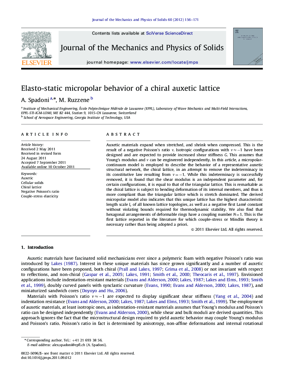 Elasto-static micropolar behavior of a chiral auxetic lattice