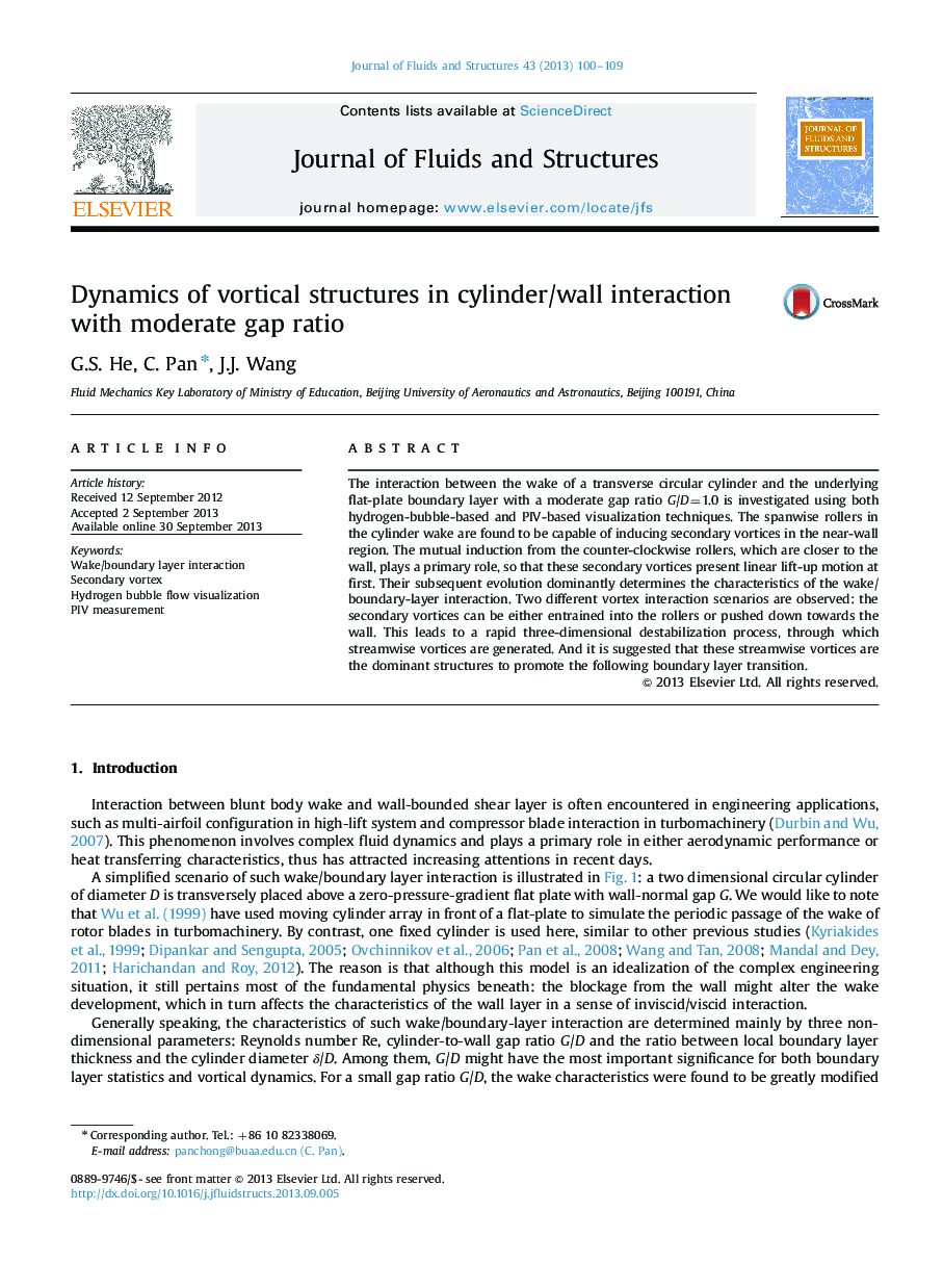 Dynamics of vortical structures in cylinder/wall interaction with moderate gap ratio