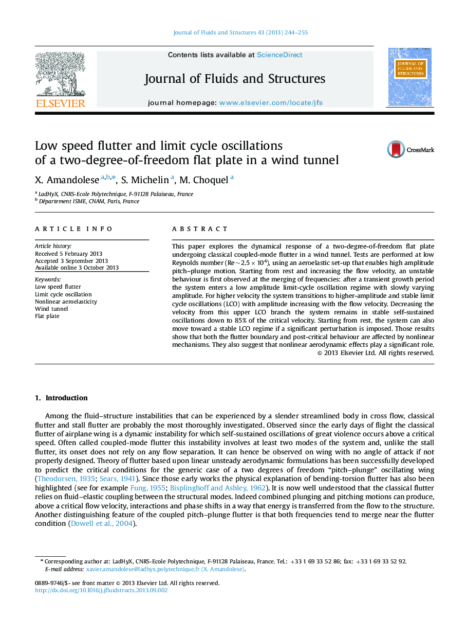 Low speed flutter and limit cycle oscillations of a two-degree-of-freedom flat plate in a wind tunnel