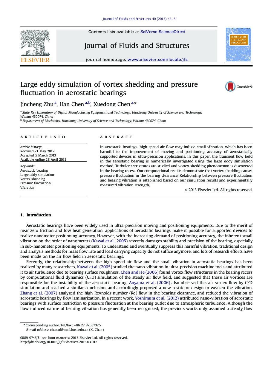 Large eddy simulation of vortex shedding and pressure fluctuation in aerostatic bearings