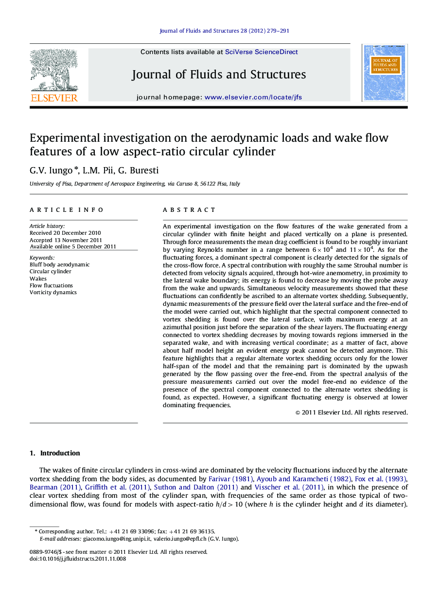 Experimental investigation on the aerodynamic loads and wake flow features of a low aspect-ratio circular cylinder