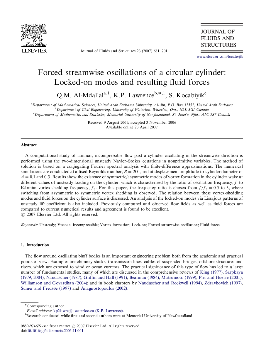 Forced streamwise oscillations of a circular cylinder: Locked-on modes and resulting fluid forces