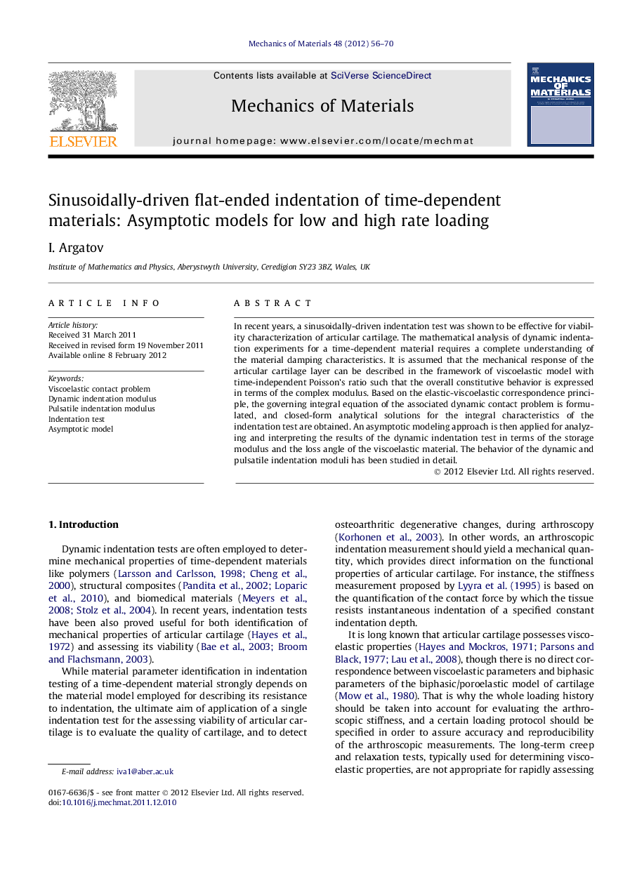 Sinusoidally-driven flat-ended indentation of time-dependent materials: Asymptotic models for low and high rate loading