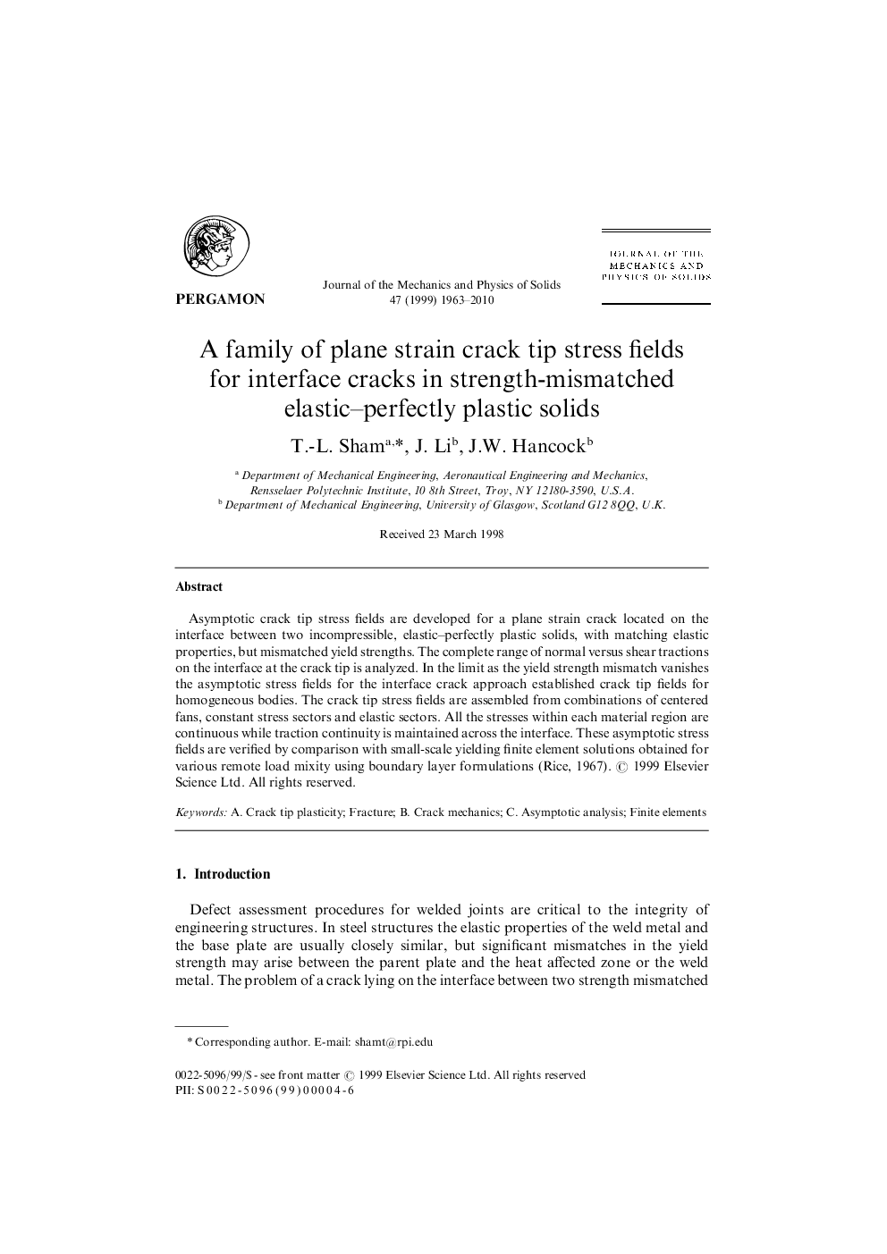 A family of plane strain crack tip stress fields for interface cracks in strength-mismatched elastic–perfectly plastic solids