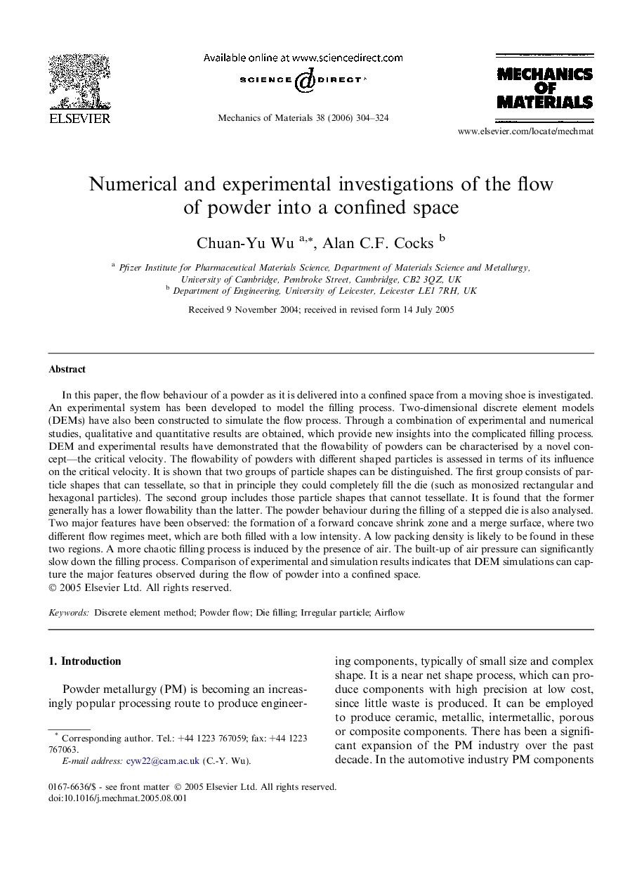 Numerical and experimental investigations of the flow of powder into a confined space