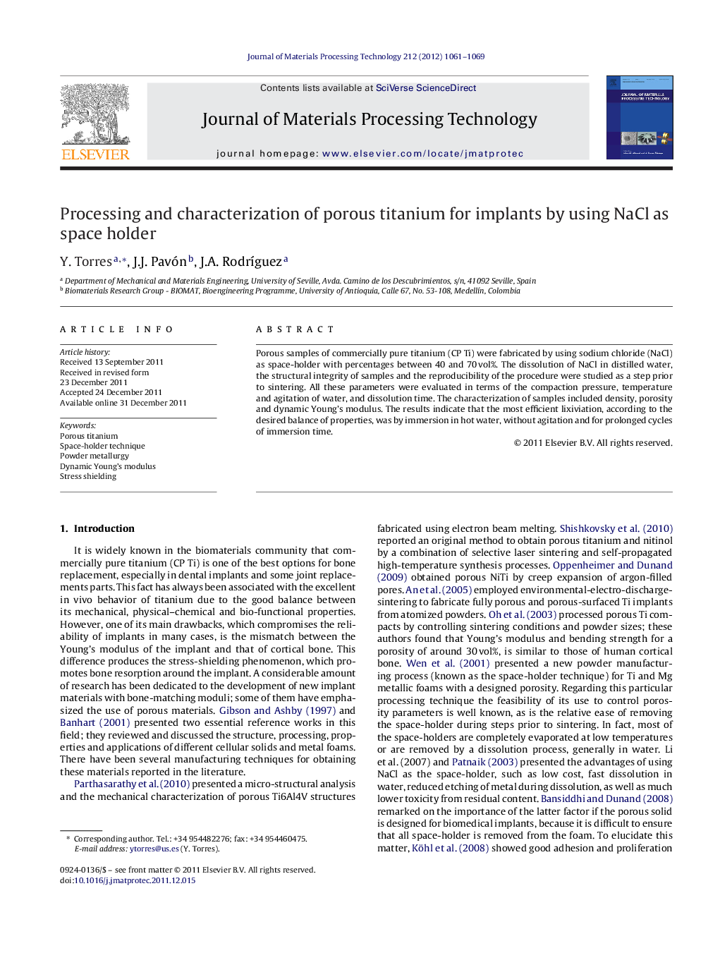 Processing and characterization of porous titanium for implants by using NaCl as space holder