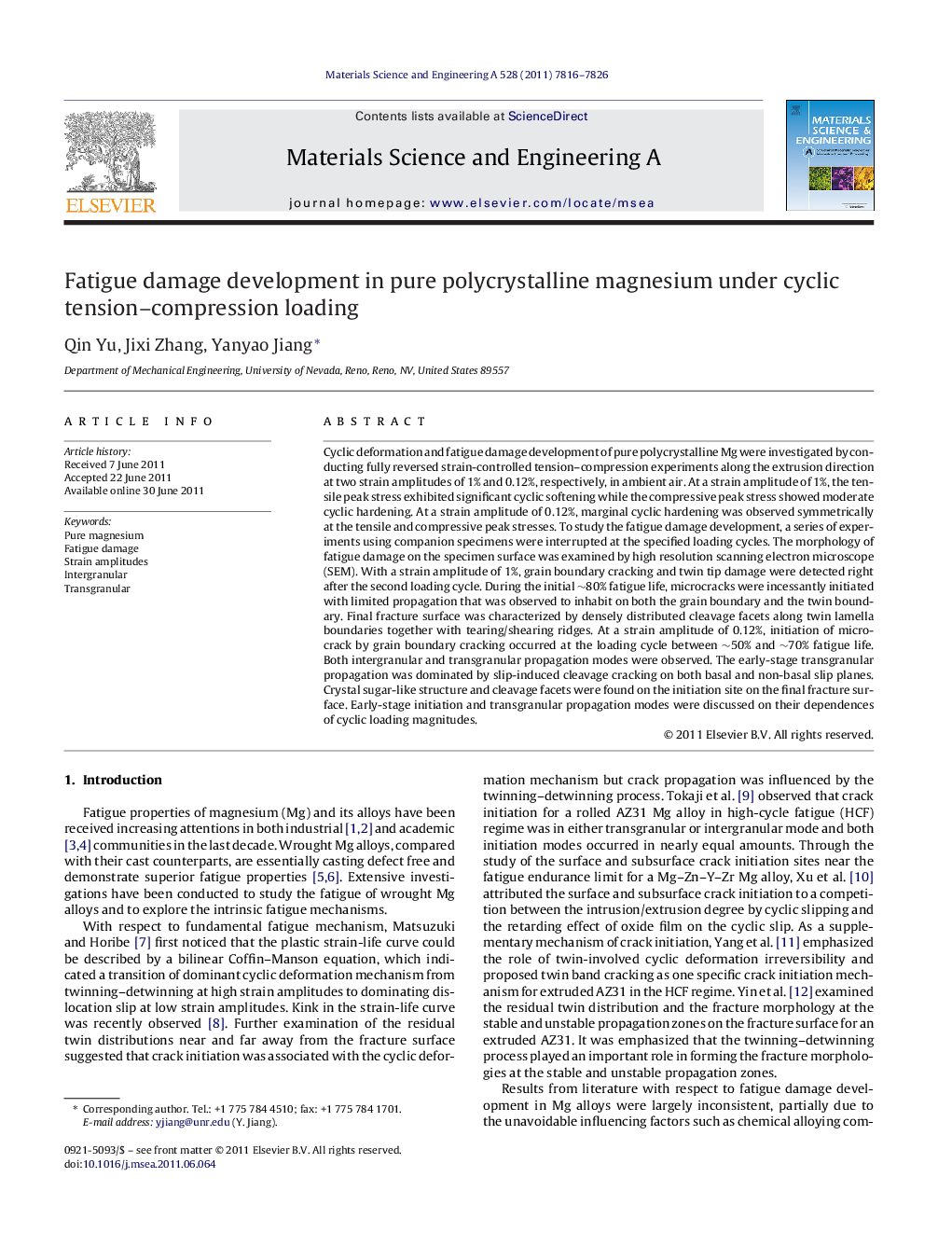 Fatigue damage development in pure polycrystalline magnesium under cyclic tension-compression loading