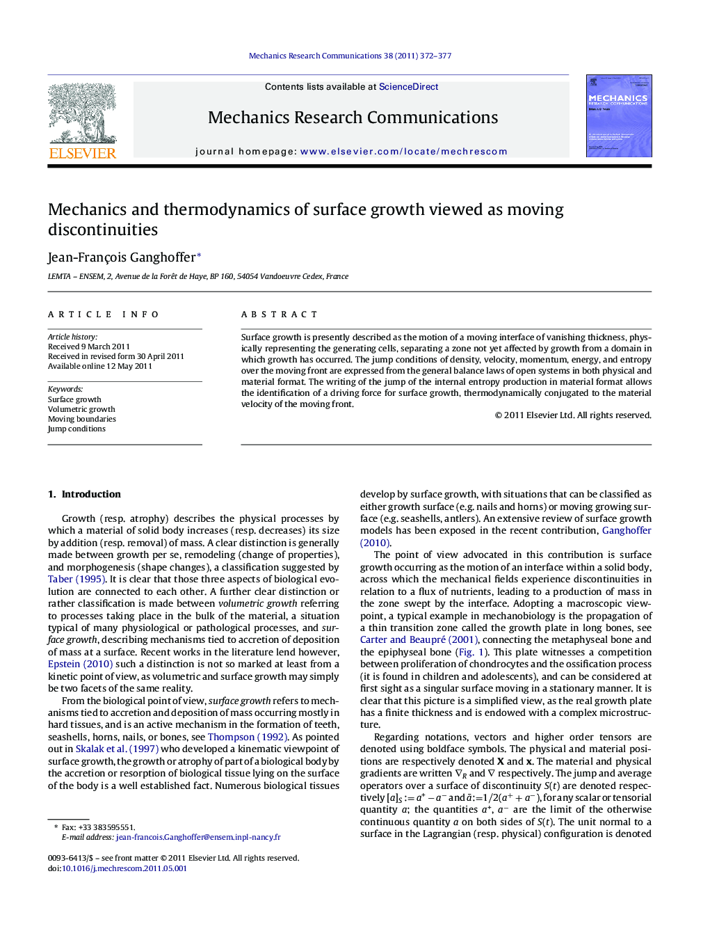 Mechanics and thermodynamics of surface growth viewed as moving discontinuities