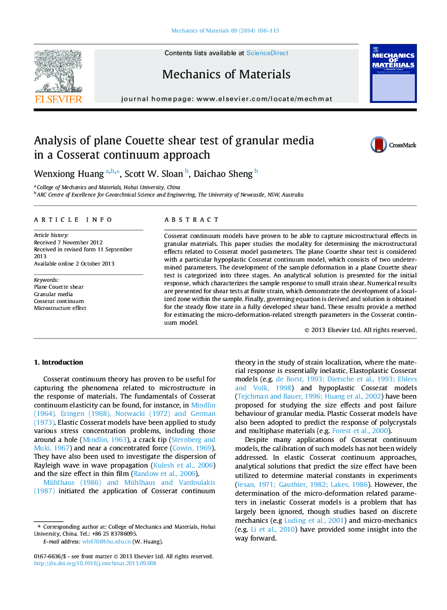 Analysis of plane Couette shear test of granular media in a Cosserat continuum approach