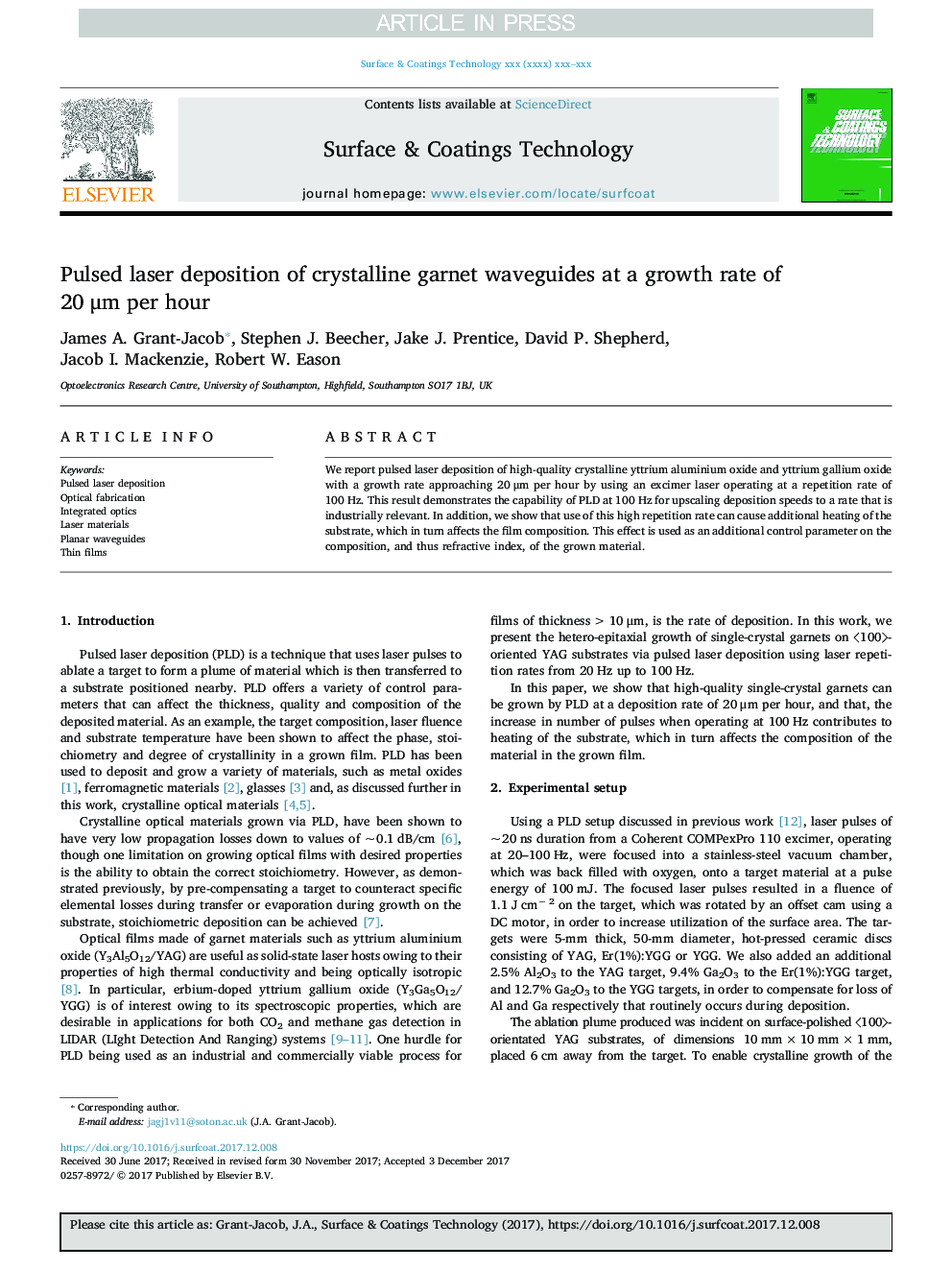 Pulsed laser deposition of crystalline garnet waveguides at a growth rate of 20Â Î¼m per hour