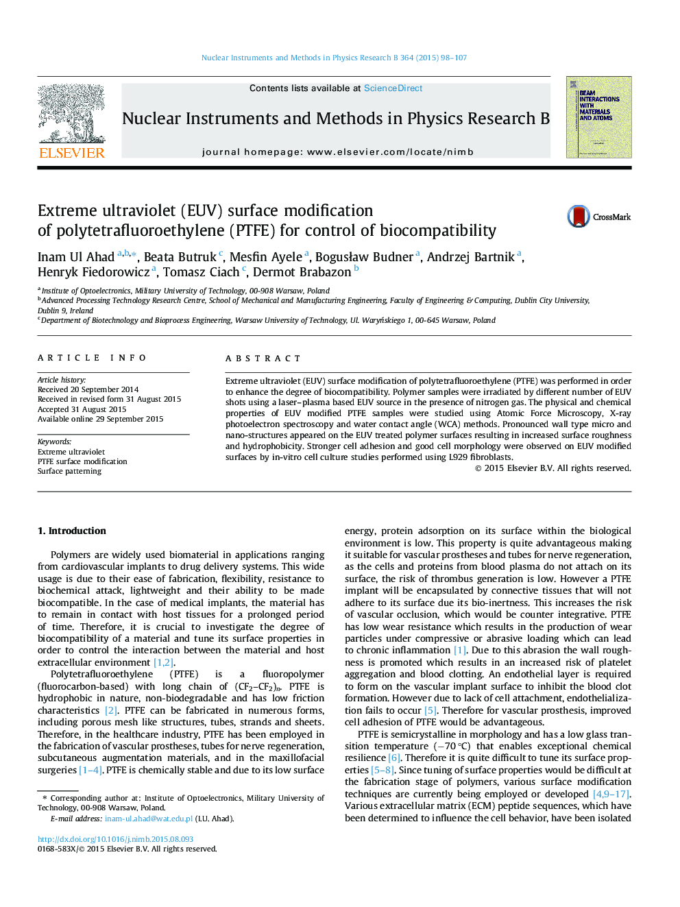 Extreme ultraviolet (EUV) surface modification of polytetrafluoroethylene (PTFE) for control of biocompatibility