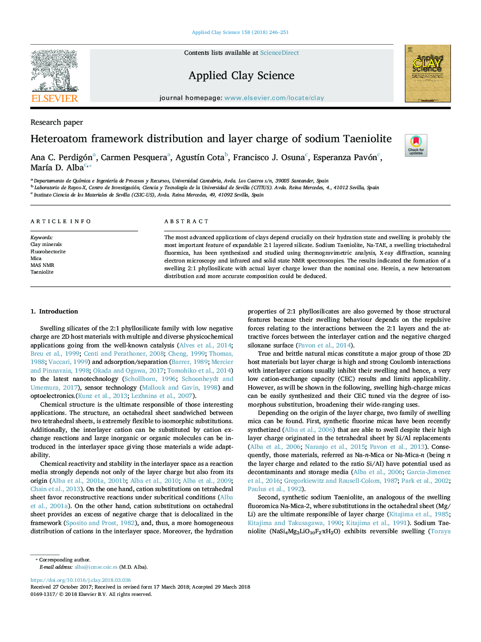 Heteroatom framework distribution and layer charge of sodium Taeniolite