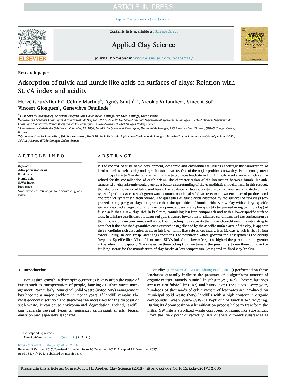 Adsorption of fulvic and humic like acids on surfaces of clays: Relation with SUVA index and acidity