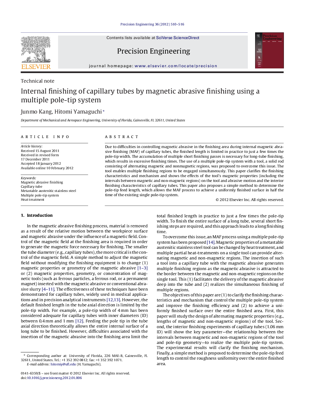 Internal finishing of capillary tubes by magnetic abrasive finishing using a multiple pole-tip system