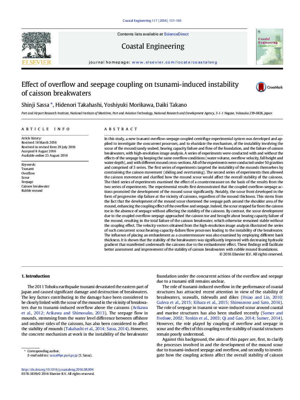 Effect of overflow and seepage coupling on tsunami-induced instability of caisson breakwaters