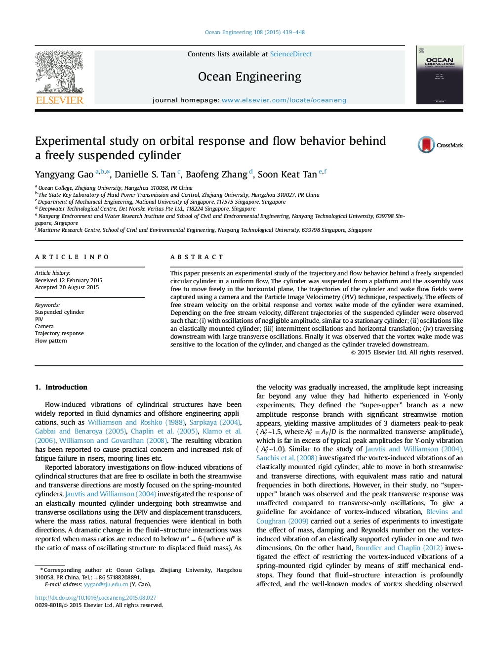 Experimental study on orbital response and flow behavior behind a freely suspended cylinder