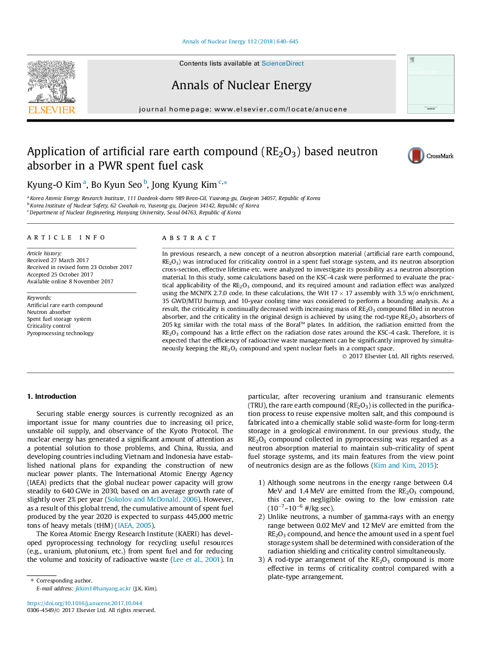 Application of artificial rare earth compound (RE2O3) based neutron absorber in a PWR spent fuel cask