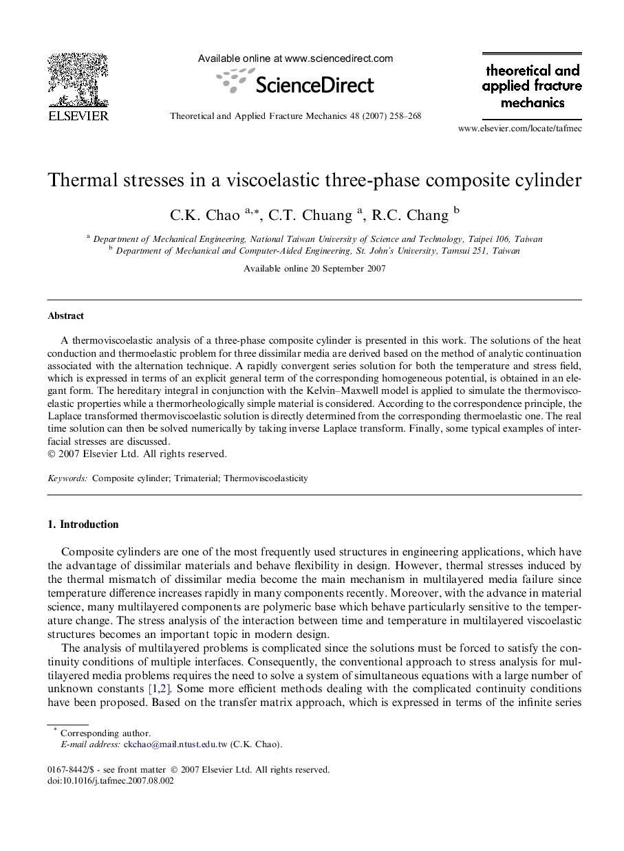 Thermal stresses in a viscoelastic three-phase composite cylinder