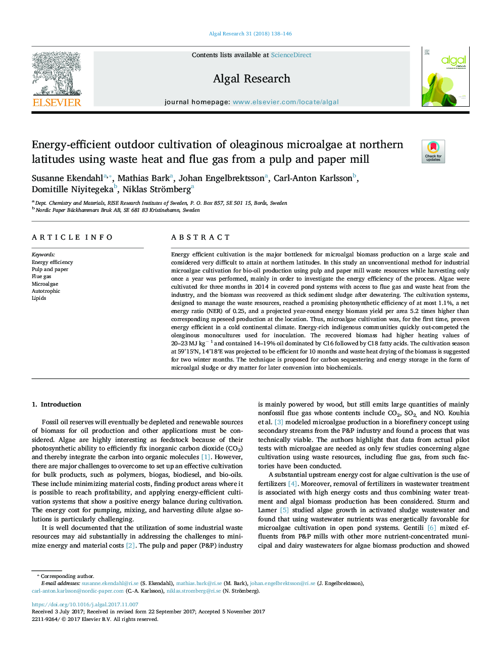 Energy-efficient outdoor cultivation of oleaginous microalgae at northern latitudes using waste heat and flue gas from a pulp and paper mill