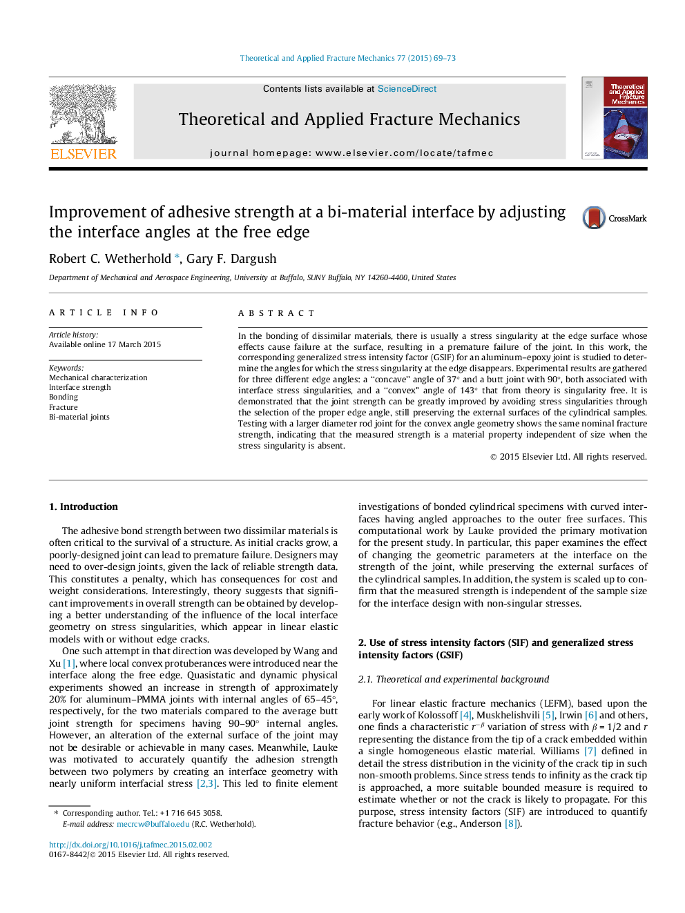 Improvement of adhesive strength at a bi-material interface by adjusting the interface angles at the free edge