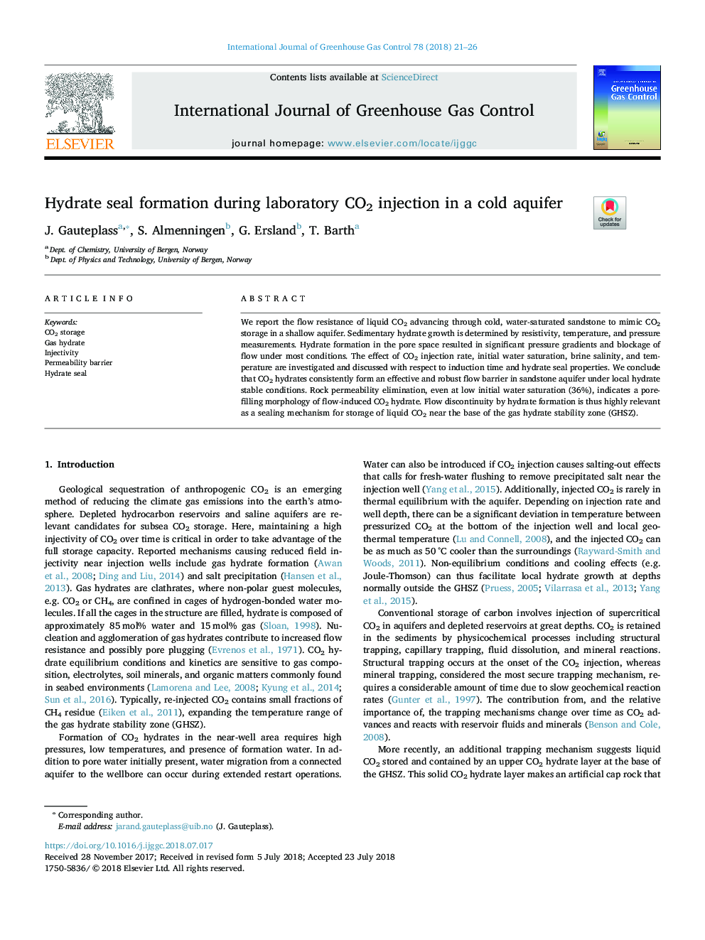 Hydrate seal formation during laboratory CO2 injection in a cold aquifer