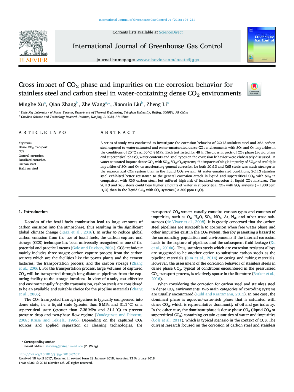 Cross impact of CO2 phase and impurities on the corrosion behavior for stainless steel and carbon steel in water-containing dense CO2 environments