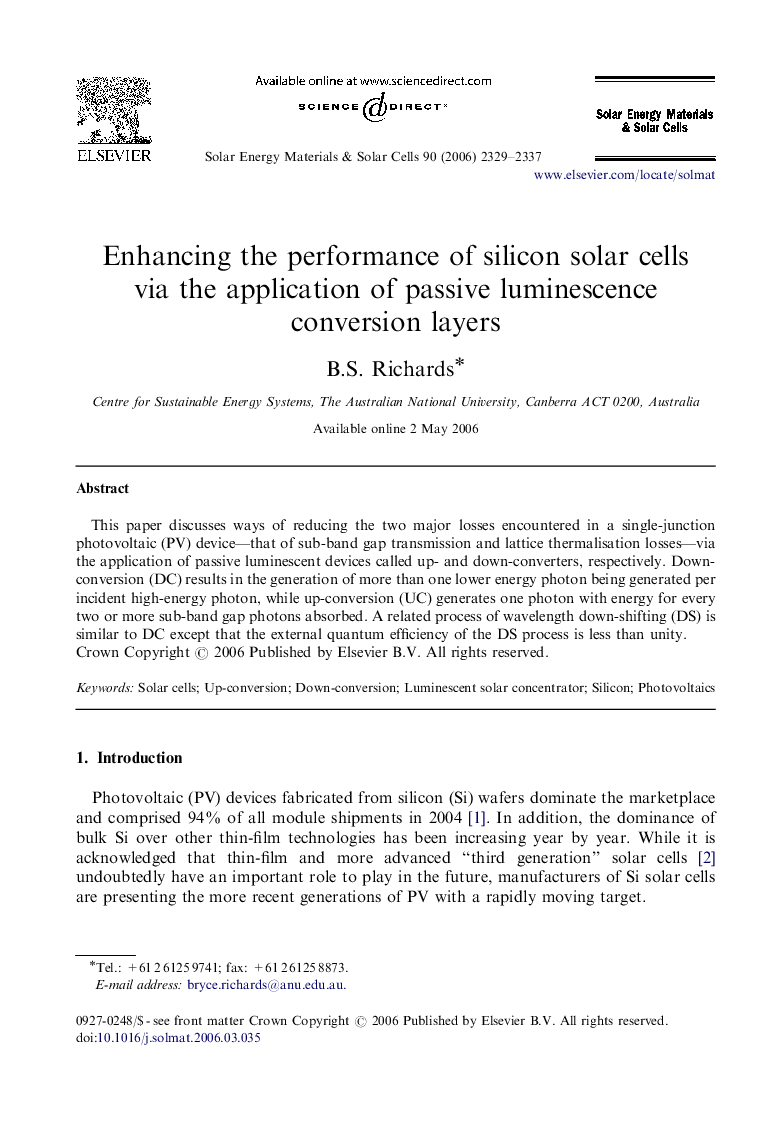 Enhancing the performance of silicon solar cells via the application of passive luminescence conversion layers