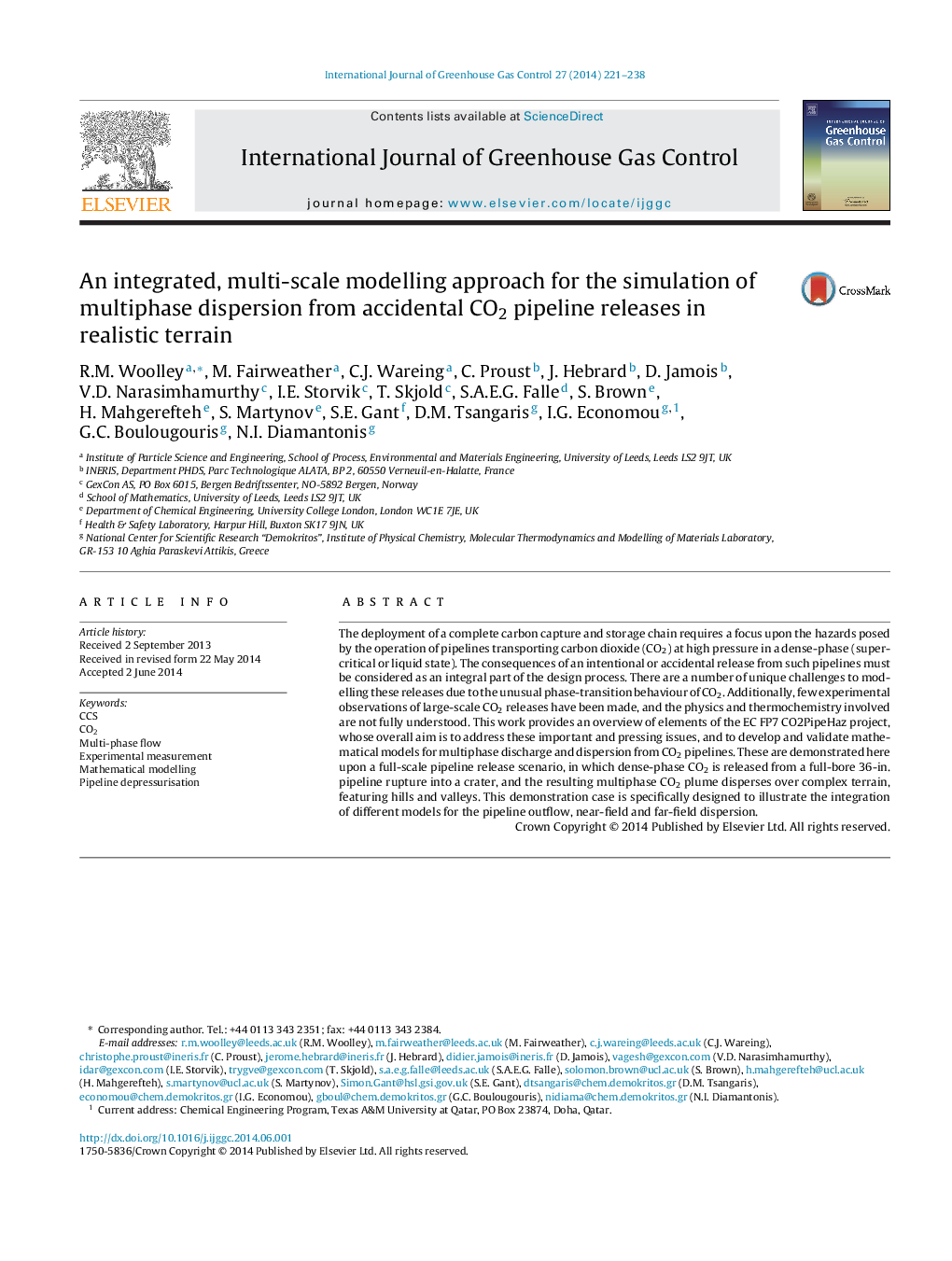 An integrated, multi-scale modelling approach for the simulation of multiphase dispersion from accidental CO2 pipeline releases in realistic terrain