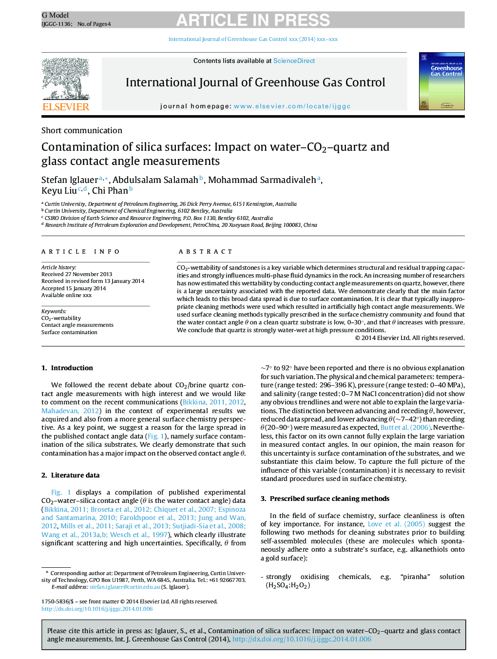 Contamination of silica surfaces: Impact on water-CO2-quartz and glass contact angle measurements