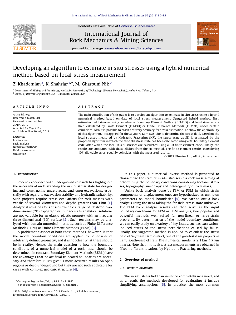 Developing an algorithm to estimate in situ stresses using a hybrid numerical method based on local stress measurement