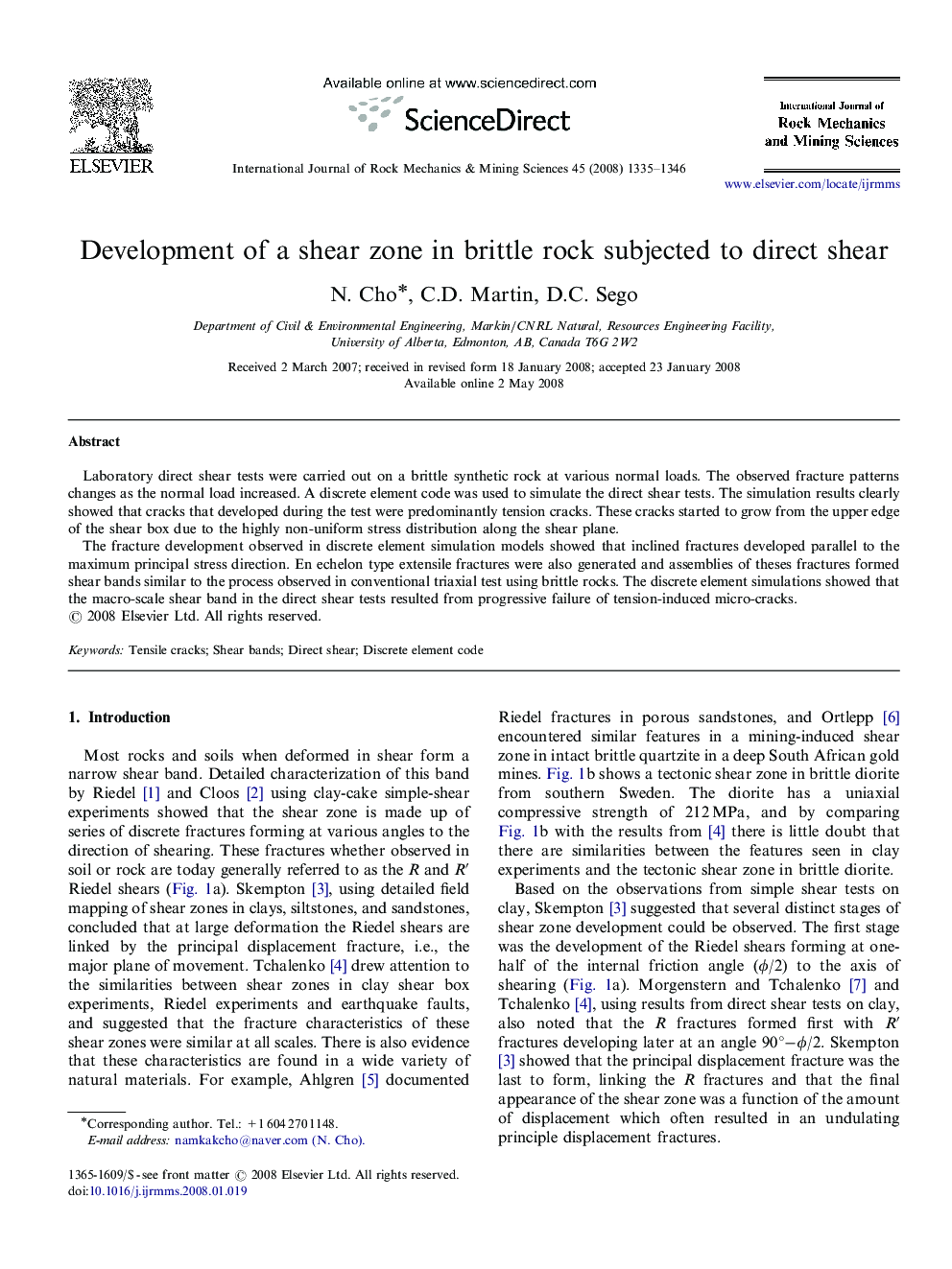 Development of a shear zone in brittle rock subjected to direct shear