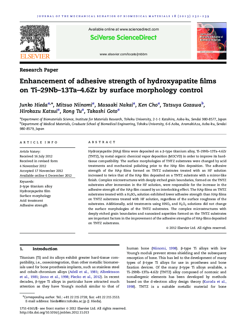 Enhancement of adhesive strength of hydroxyapatite films on Ti–29Nb–13Ta–4.6Zr by surface morphology control