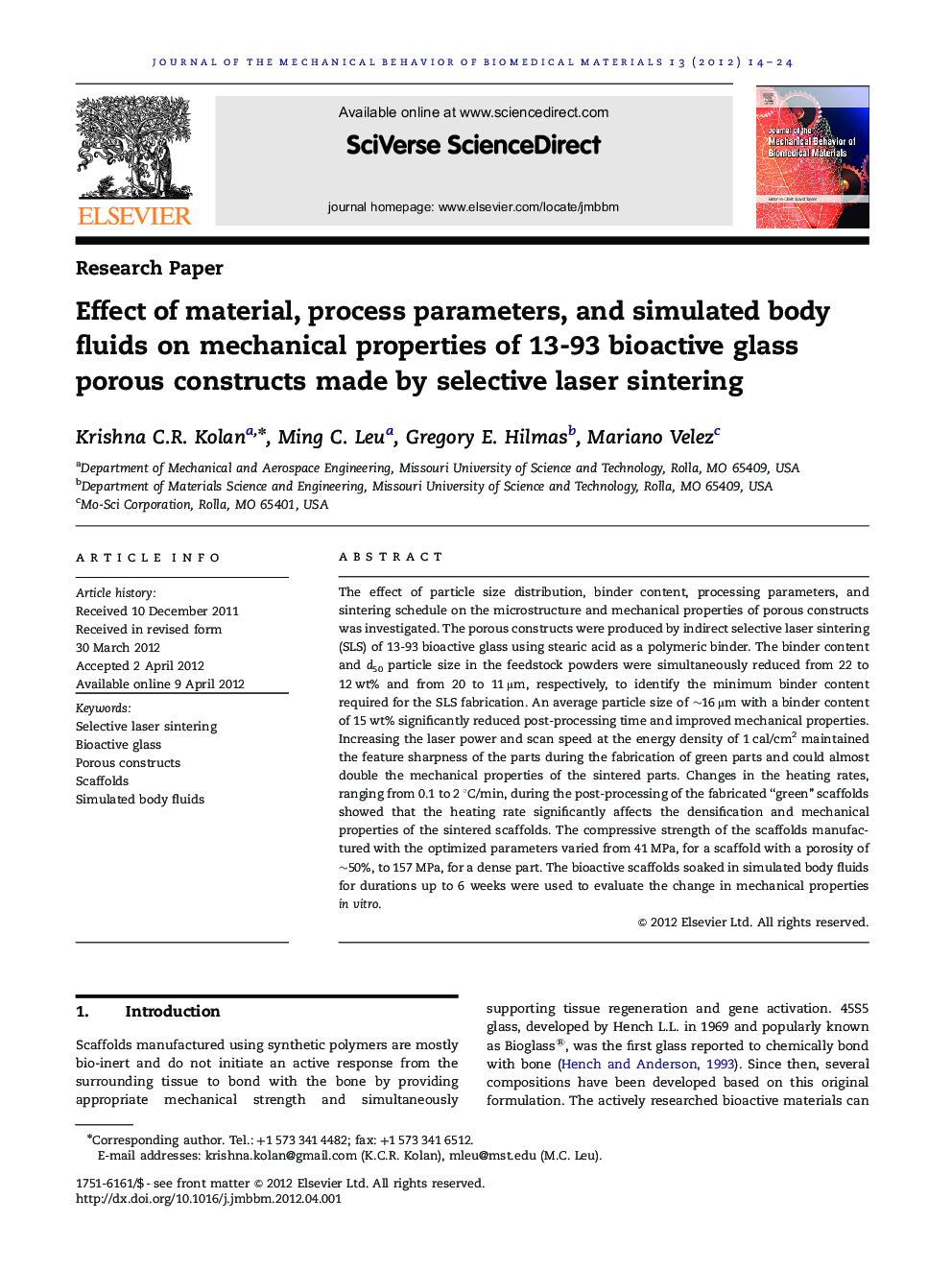 Effect of material, process parameters, and simulated body fluids on mechanical properties of 13-93 bioactive glass porous constructs made by selective laser sintering