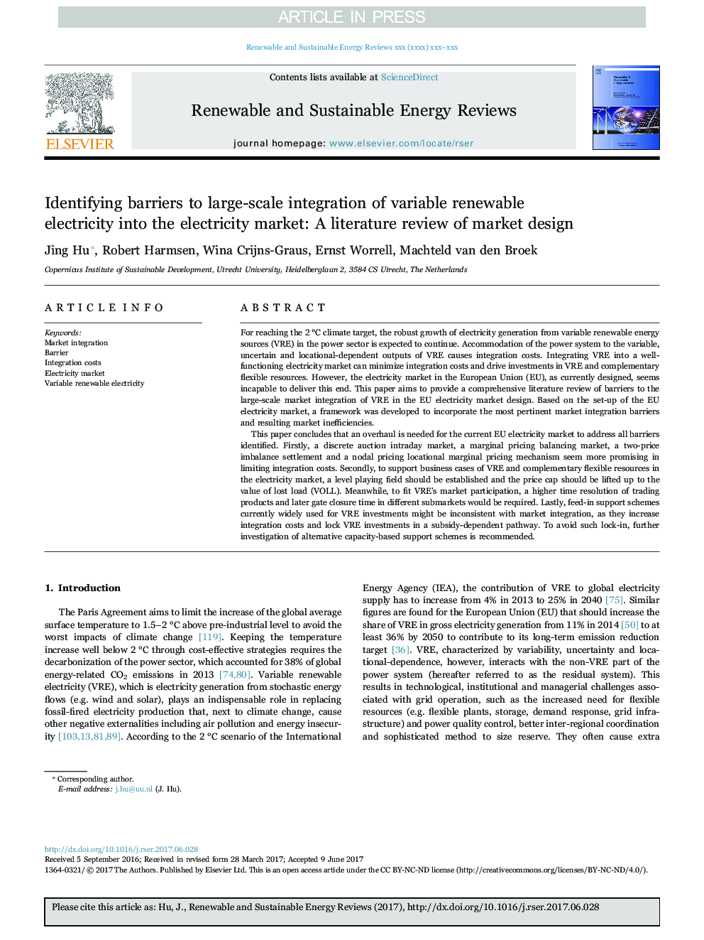 Identifying barriers to large-scale integration of variable renewable electricity into the electricity market: A literature review of market design