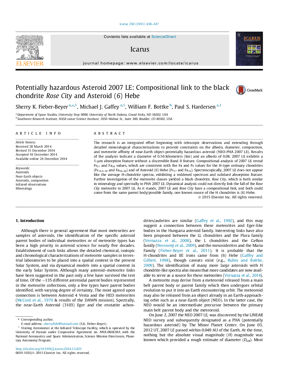 Potentially hazardous Asteroid 2007 LE: Compositional link to the black chondrite Rose City and Asteroid (6) Hebe