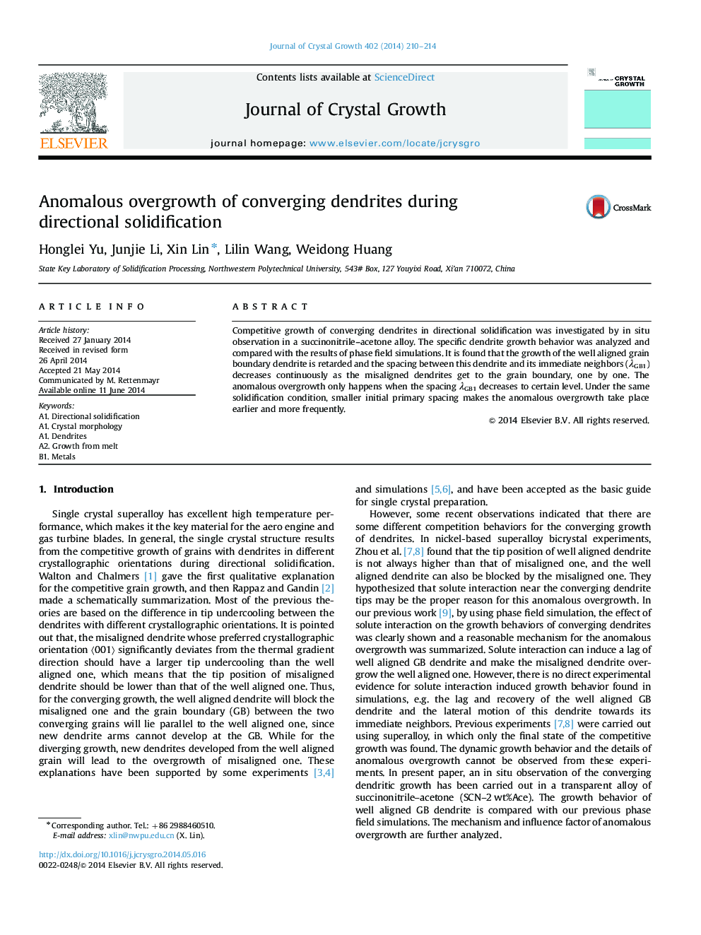 Anomalous overgrowth of converging dendrites during directional solidification